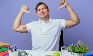 Man feeling energized and focused at desk, highlighting benefits of natural energy boosters
