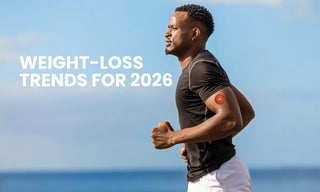 Man jogging outdoors wearing a smart fitness patch on his arm, representing weight-loss trends for 2026 and modern hunger-control technology.
