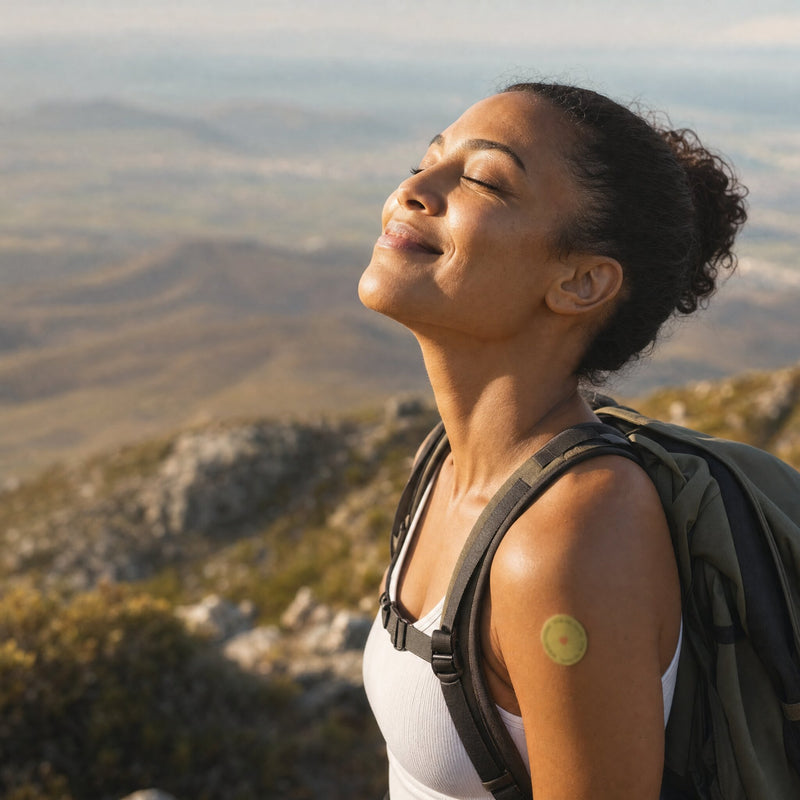 Woman hiking with a patch on her arm